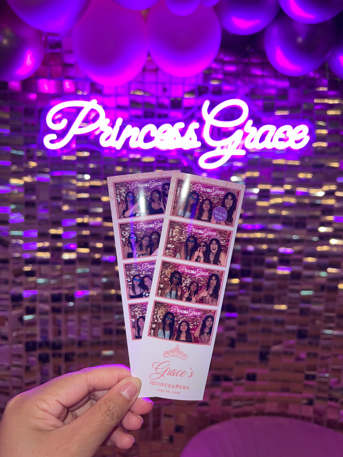 Photo strips held up at a Princess Grace quinceañera with a purple neon backdrop